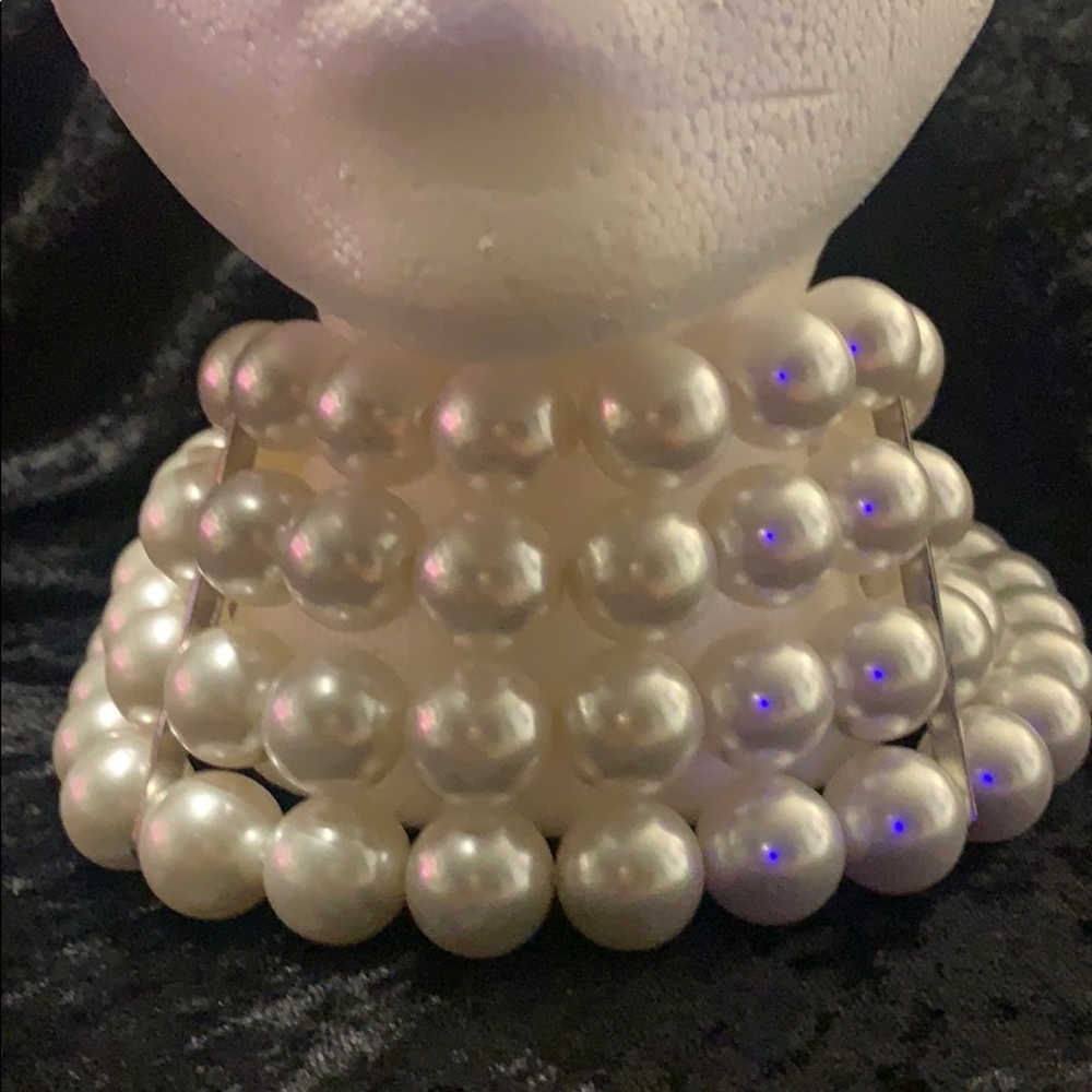 Woman’s four strand (costume) pearl necklace